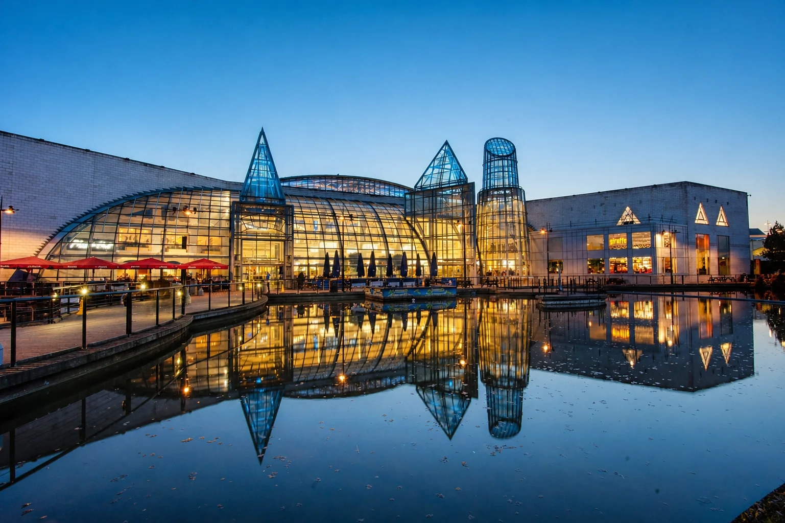 Bluewater Shopping Centre Kent -- the landmark glass and steel retail destination at dusk